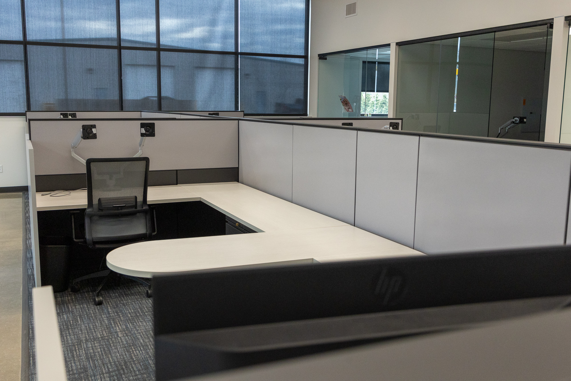 empty office cubicle with chair