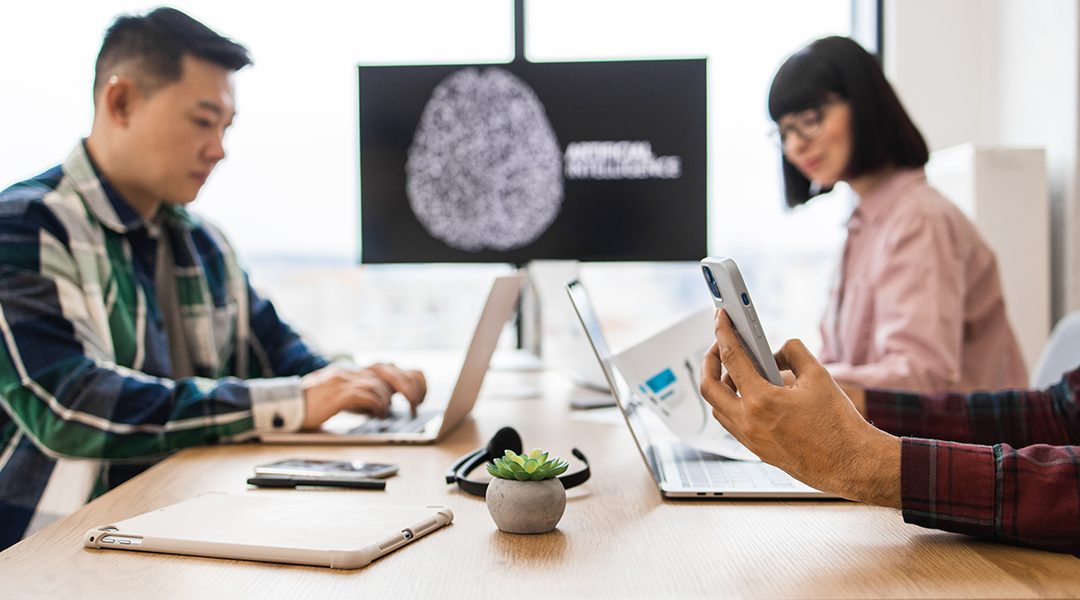 Teamwork session on artificial intelligence development in modern office
